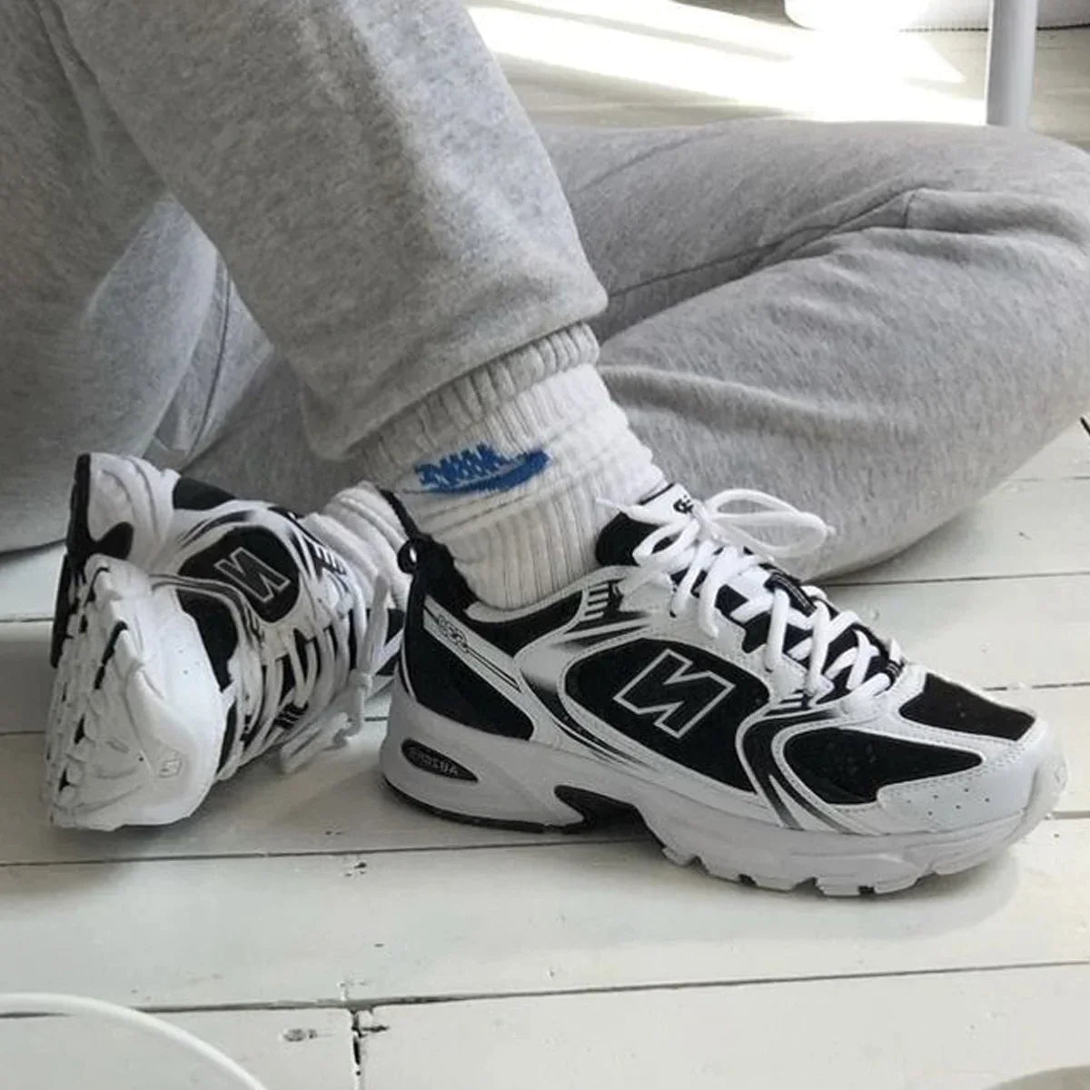 530 White & Black Sports Style Sneakers