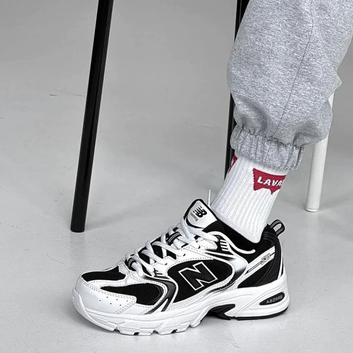 530 White & Black Sports Style Sneakers